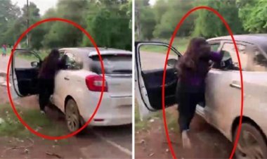 पत्नी को चलती कार से घसीटा, बाल-बाल बची...
