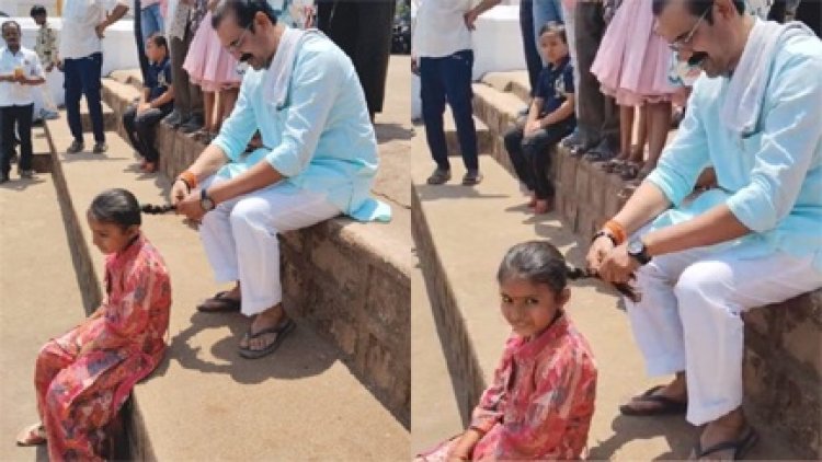 विधायक कुंवर सिंह निषाद नन्ही बच्ची की चोटी बनाते नजर आए, सोशल मीडिया पर वीडियो हुआ वायरल