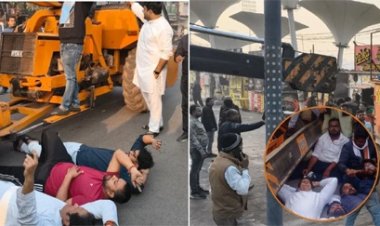 रायपुर में चौपाटी की शिफ्टिंग के विरोध में क्रेन के सामने लेटे कांग्रेसी